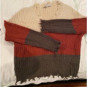 Womens distressed V neck sweater Boutique